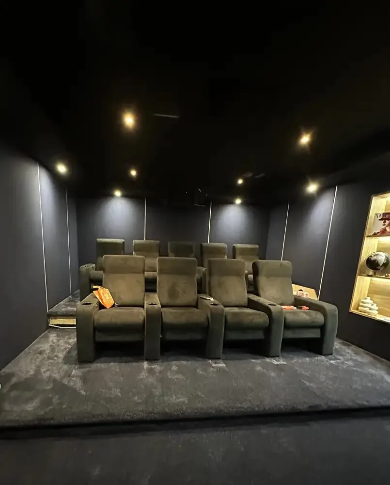 Tiered recliners in a finished 1Install home cinema, the kind of room where a home cinema LED wall can take the place of a projector