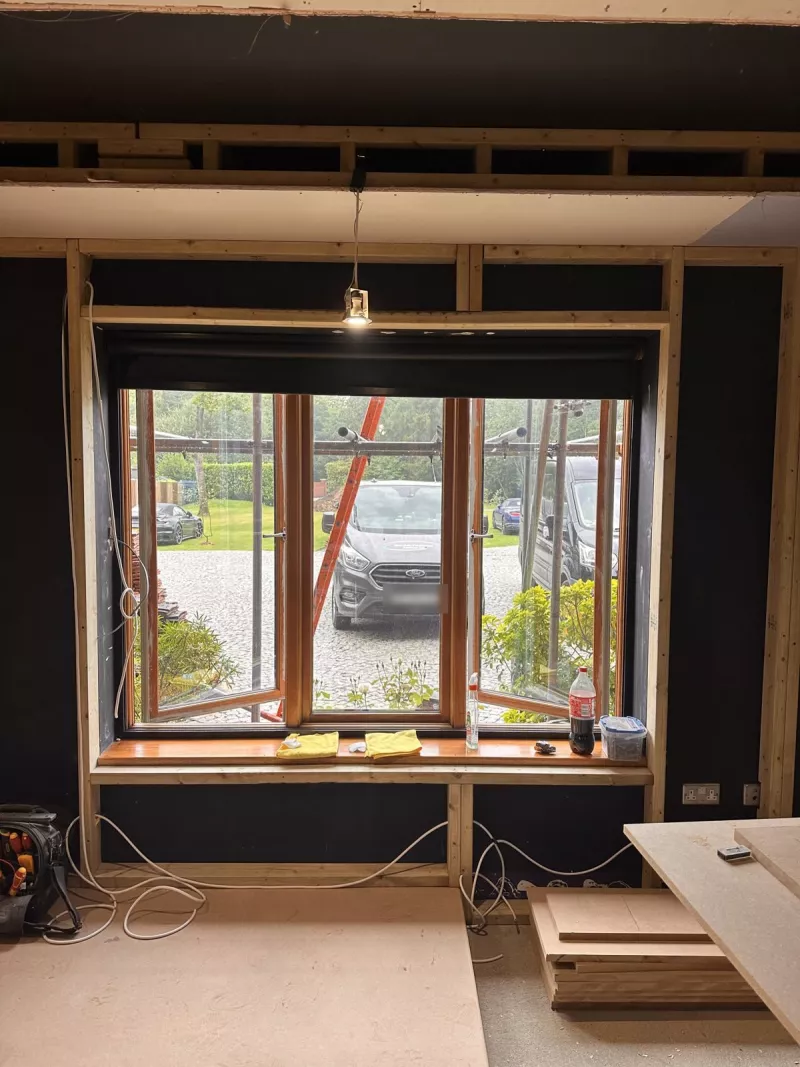 Stud wall framed around the window before it was blocked up
