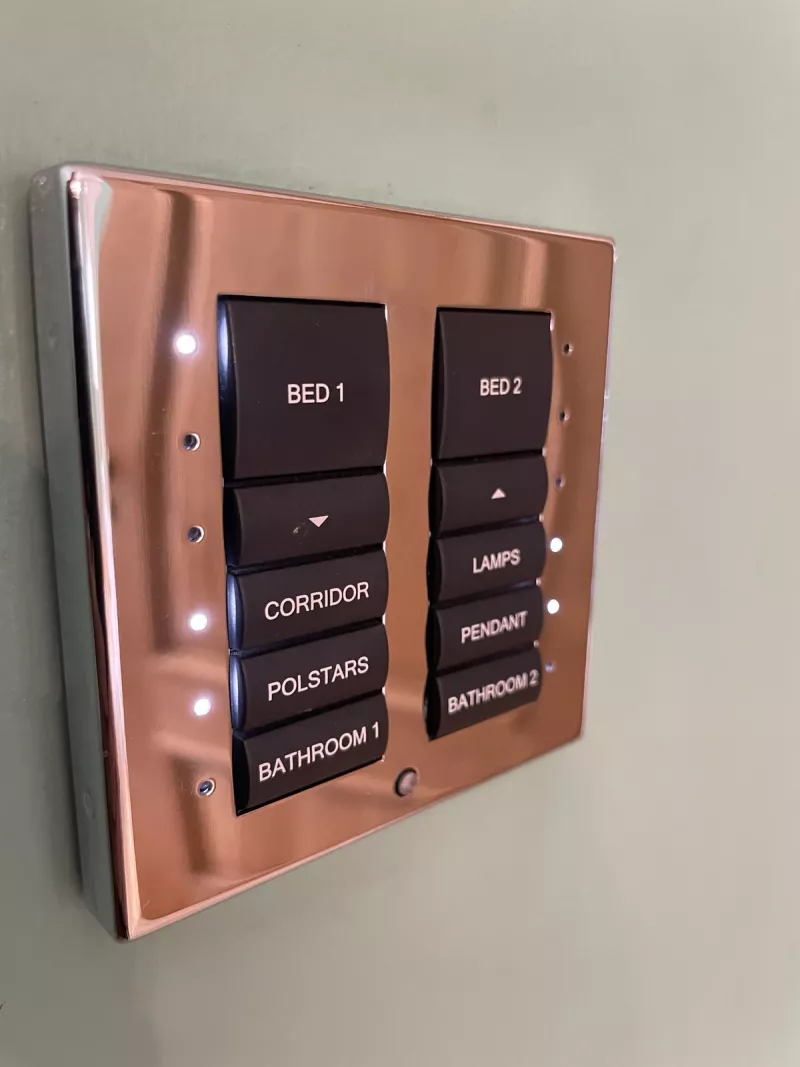 Rose gold lighting keypad with engraved black buttons