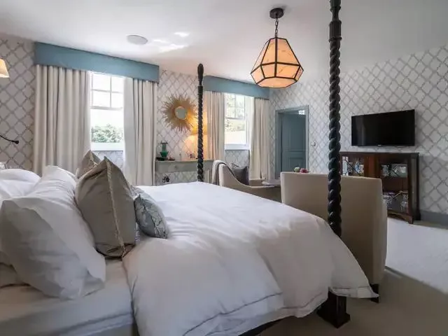 Principal bedroom with automated curtains in Kinsale, Cork
