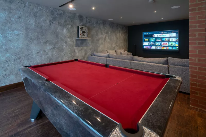 Games room with pool table and TV