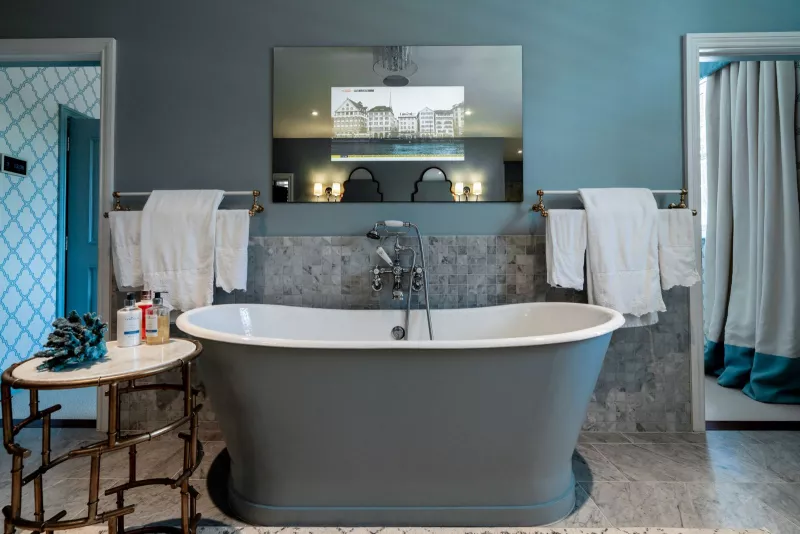 Bathroom with mirror TV