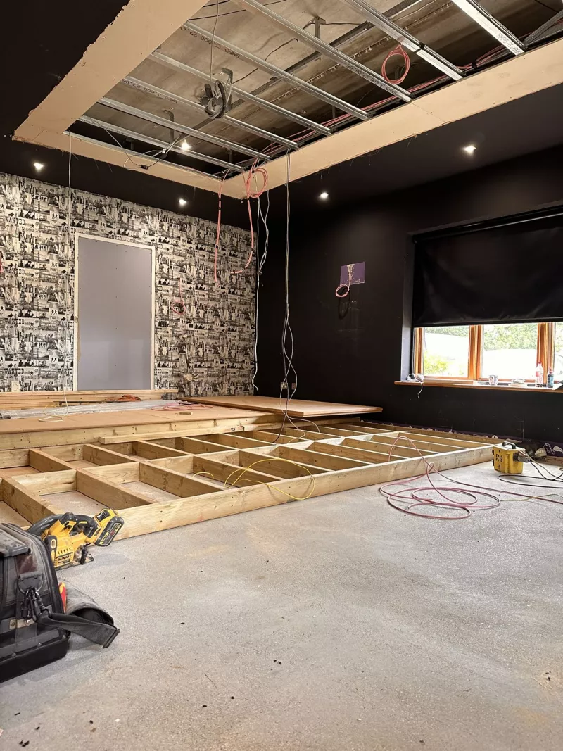 Timber platform framed up for the raised back row
