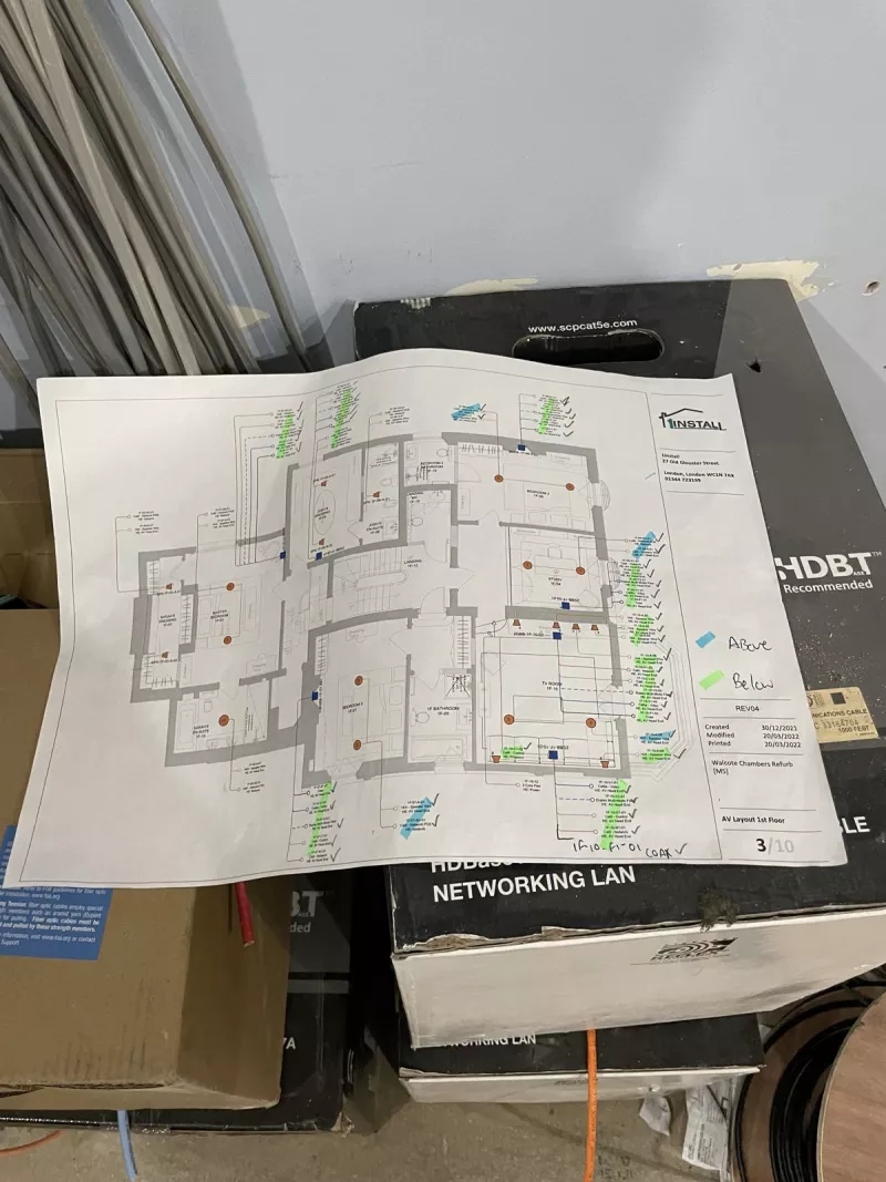 Marked up lighting drawings on site