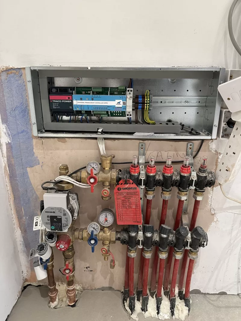 Cabling and heating manifolds in the plant room